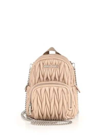 Miu Miu Mini Matelasse Leather Crossbody Backpack In Cammeo