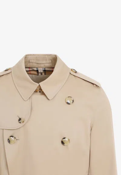 Shop Burberry Belted Double-breasted Trench Coat In Beige