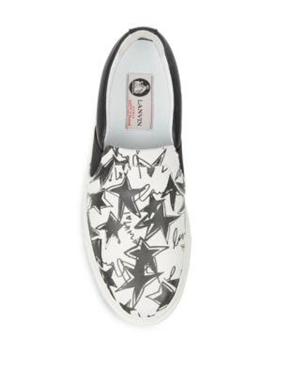 Shop Lanvin Star-print Leather Slip-on Trainers In Black-white