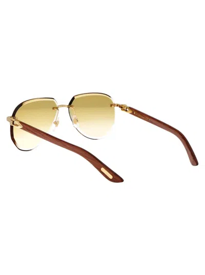 Shop Cartier Sunglasses In 004 Gold Brown Yellow