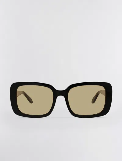 Shop Bcbgmaxazria 1982 Rectangle Sunglasses In Black W/light Brown Lens