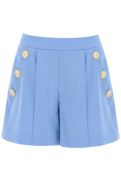 Shop Balmain Embossed Button Shorts With Women In Blue