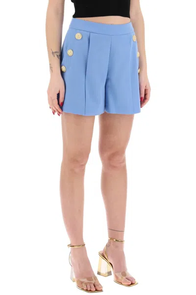 Shop Balmain Embossed Button Shorts With Women In Blue