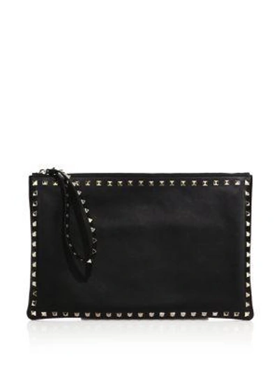Shop Valentino Rockstud Leather Zip Clutch In Black