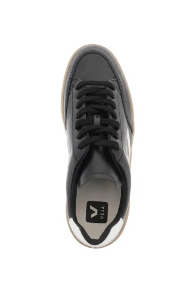 Shop Veja Leather V 12 Sneakers In Black