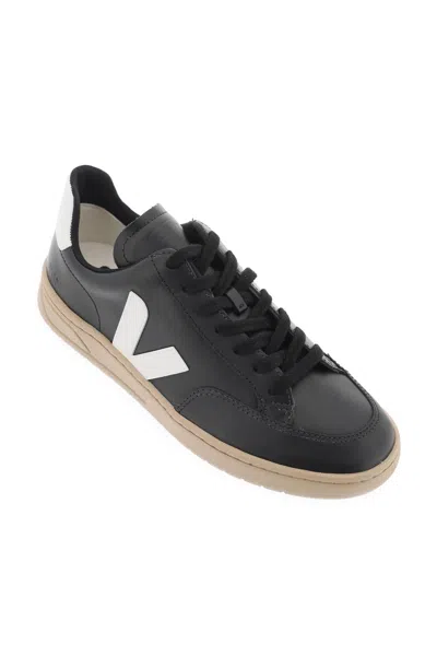 Shop Veja Leather V 12 Sneakers In Black