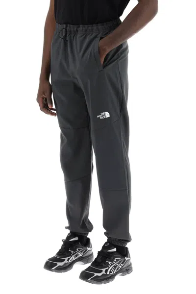Shop The North Face Mountain Athletics Windproof Joggers In Grey