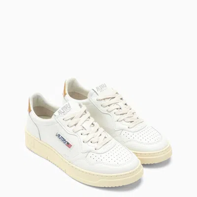 Shop Autry Medalist White/bronze Sneakers