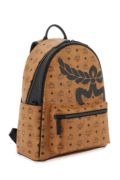 Shop Mcm Medium Stark Backpack In Mega Laurel Visetos Men In Brown