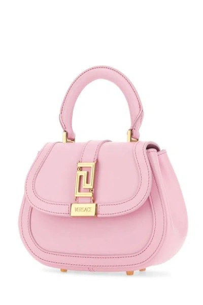 Shop Versace Woman Pink Leather Mini Greca Goddess Handbag