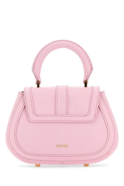 Shop Versace Woman Pink Leather Mini Greca Goddess Handbag