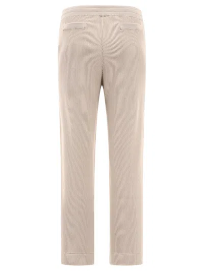 Shop Brunello Cucinelli Trousers With Shiny Eyelets