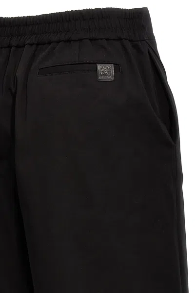 Shop Loewe Women Turn-up Crop Trousers In Black