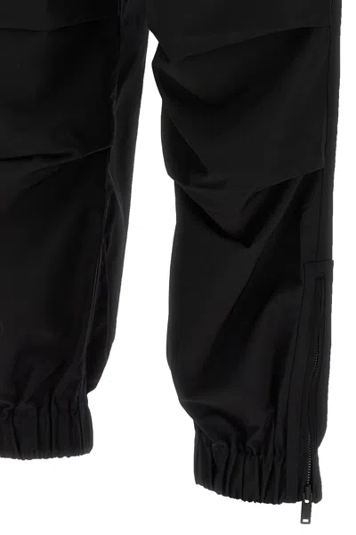 Shop Moose Knuckles Men 'arnaud' Trousers In Black