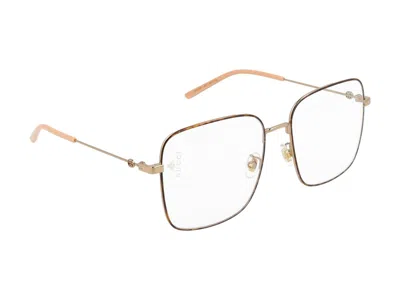 Shop Gucci Eyeglasses In Gold Gold Transparent