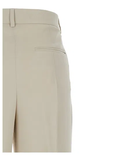 Shop Totême Beige Relaxes Tailored Trousers In Wool Blend Woman
