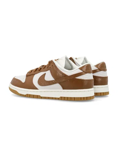 Shop Nike Dunk Low Lx Woman Sneakers In White/brown