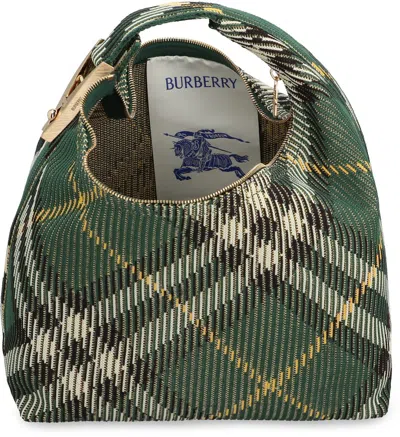 Shop Burberry Peg Handbag In Green