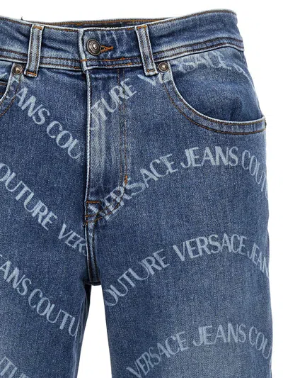 Shop Versace Jeans Couture Logo Print Jeans In Blue