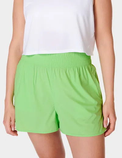 Shop Sweaty Betty Relay Shell Shorts In Green