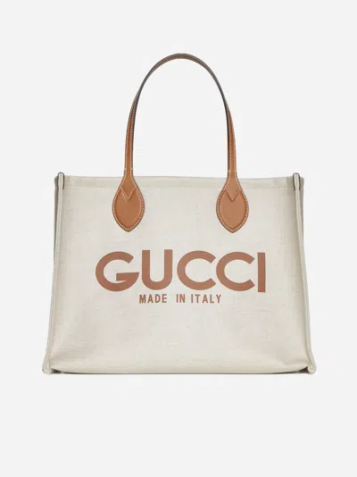 Shop Gucci Logo Canvas Tote Bag In Beige,tan