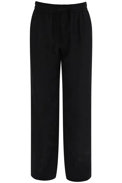 Shop Dolce & Gabbana Dg Jacquard Pants In Black