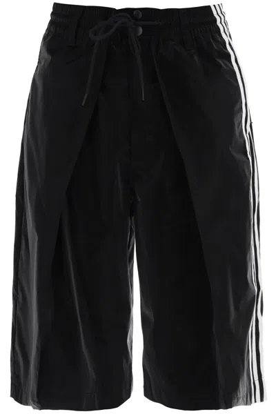 Shop Y-3 Shiny Nylon Bermuda Shorts In Black