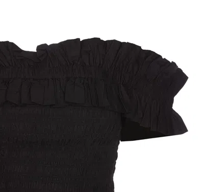 Shop Ganni Off-shoulder Smocked Top In Black