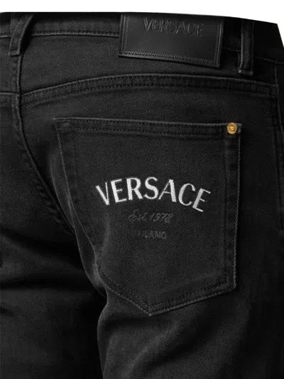 Shop Versace Jeans In Faded Washed Black