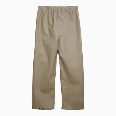 Shop Fear Of God Rubberized Wide-leg Trousers Dune In Beige