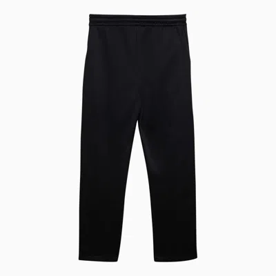 Shop Fear Of God Striped And Jogging Trousers In Black