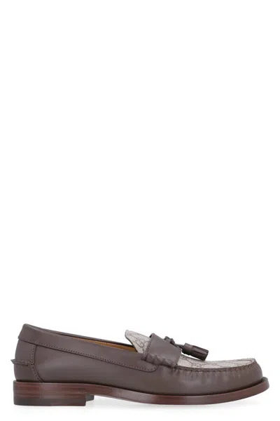 Shop Gucci Leather Loafers With Decorative Tassels In Brown