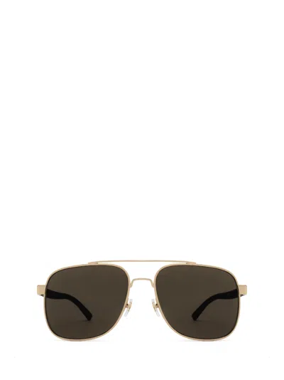 Shop Gucci Gg0422s Gold Sunglasses
