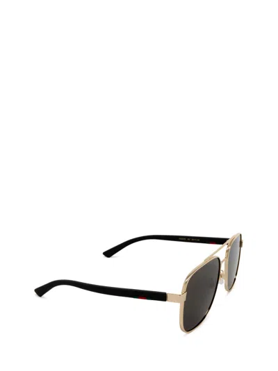 Shop Gucci Gg0422s Gold Sunglasses