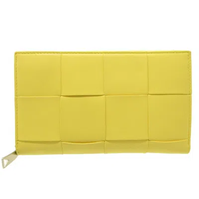 Shop Bottega Veneta Cassette Yellow Leather Wallet  ()