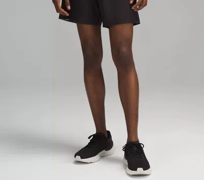 Shop Lululemon Men's Lined Surge Shorts 6" In Black