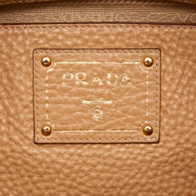 Shop Prada Saffiano Beige Leather Travel Bag ()