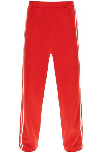 Shop Ami Alexandre Mattiussi Ami Alexandre Matiussi Track Pants With Side Bands Men In Red