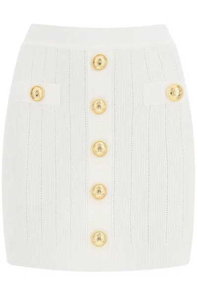 Shop Balmain Knit Mini Skirt With Embossed Buttons Women In White