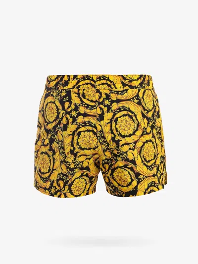 Shop Versace Man Swim Trunks Man Gold Swimwear