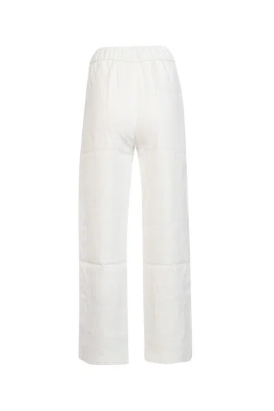 Shop Co Pants In Ivory