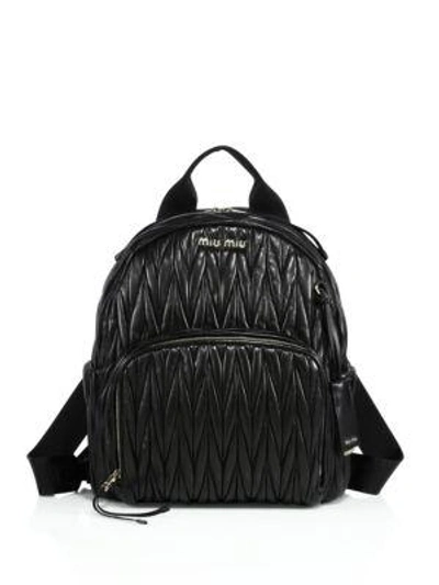 Shop Miu Miu Matelassé Leather Backpack In Black