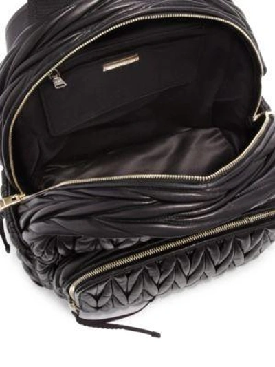 Shop Miu Miu Matelassé Leather Backpack In Black