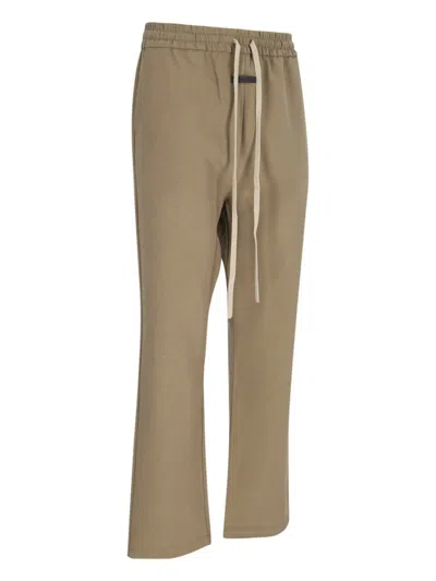 Shop Fear Of God Trousers In Brown