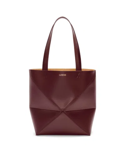 Shop Loewe Puzzle Fold Tote Bag In Shiny Calfskin In Red