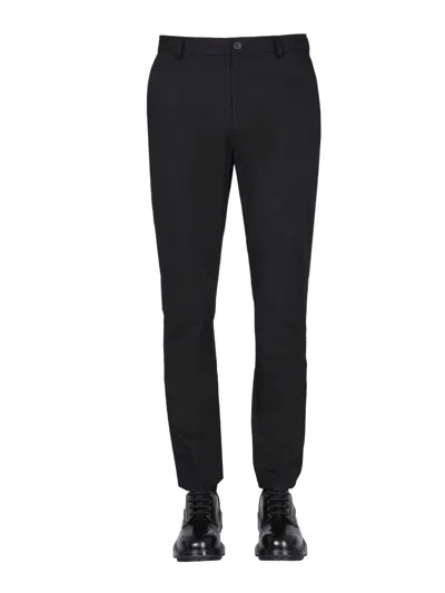 Shop Burberry Slim-fit Chino Pants In Nero