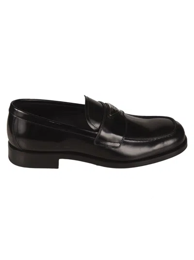 Shop Prada Low Top Loafers In Nero