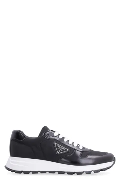 Shop Prada Prax 01 Low-top Sneakers In Black