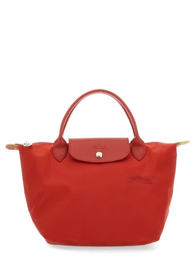 Shop Longchamp Le Pliage Small Bag In Red