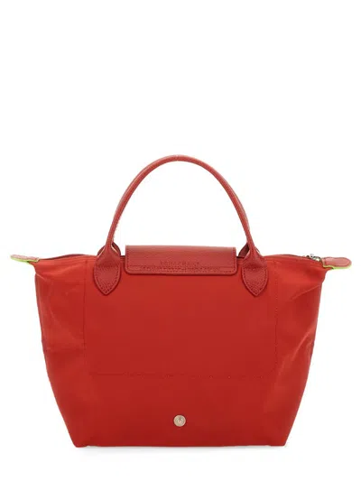 Shop Longchamp Le Pliage Small Bag In Red